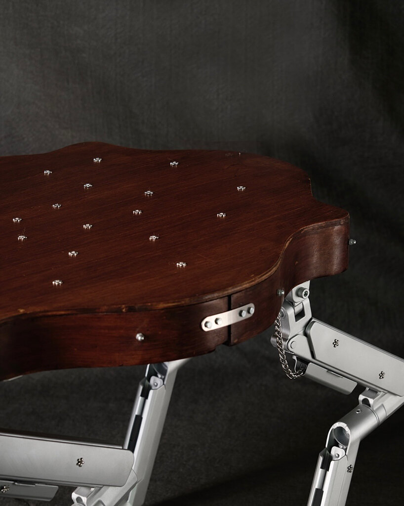 19th-century coffee table gets articulated computer arms to take on a canine form - 3