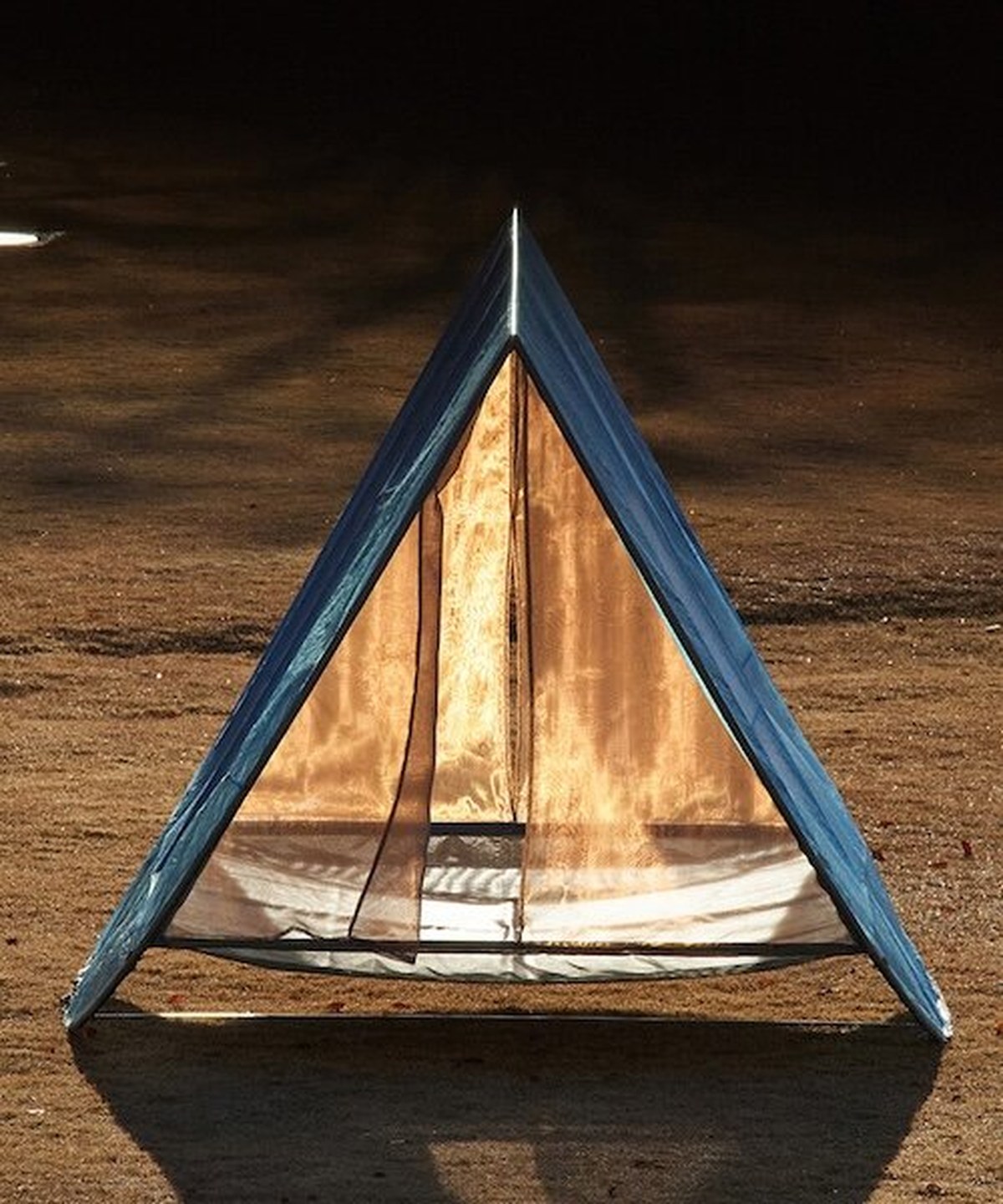 tato architects suspends arc tent somewhere between a hammock and a campsite
