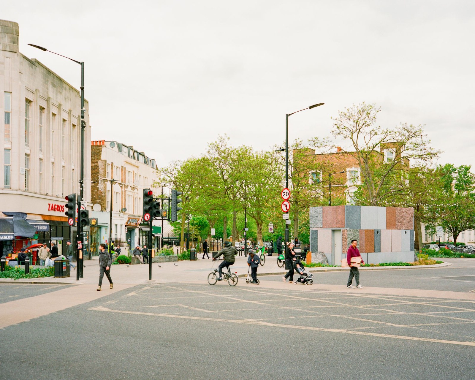 exterior view of Maida Vale public toilet by Studio Weave made out of reclaimed stone, looking like square patchwork