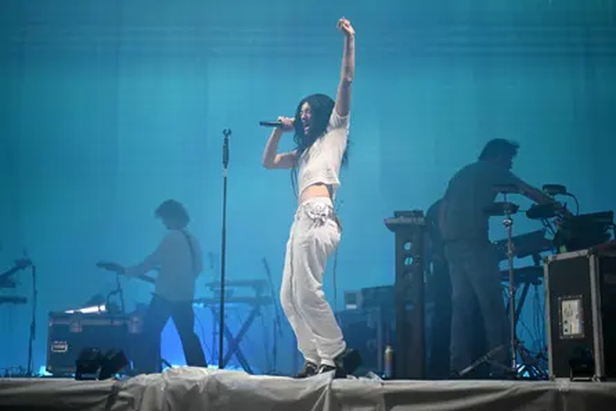 Lorde singing on a stage at Glastonbury