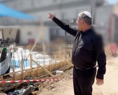 Itamar Ben-Gvir points at a building site for gallows where Palestinian convicts will be executed.