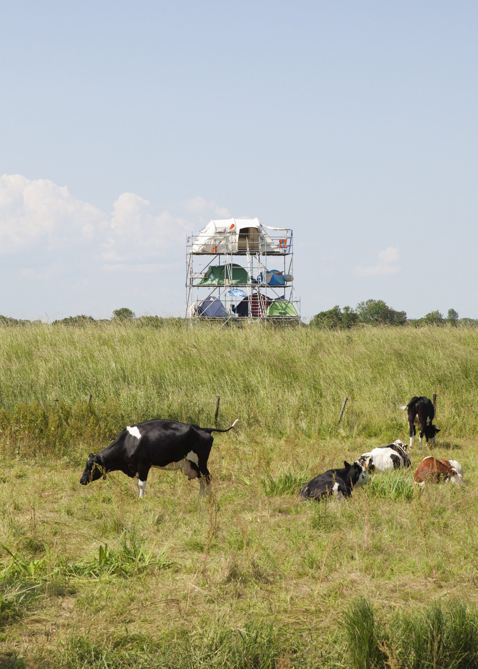 willem de haan stacks 12 tents vertically to question density and the way we occupy space - 2
