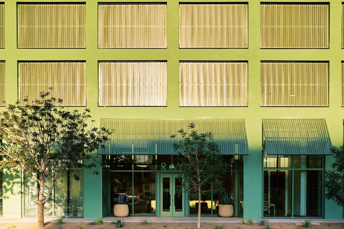RAY Phoenix images of contemporary residential building with swimming pool amenities and midcentury feel