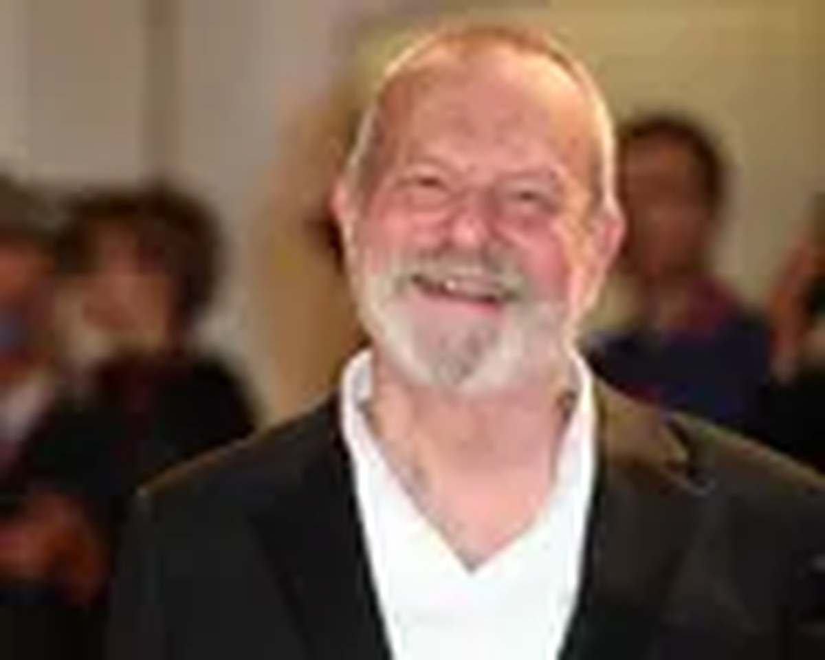 Terry Gilliam in a black jacket and white shirt