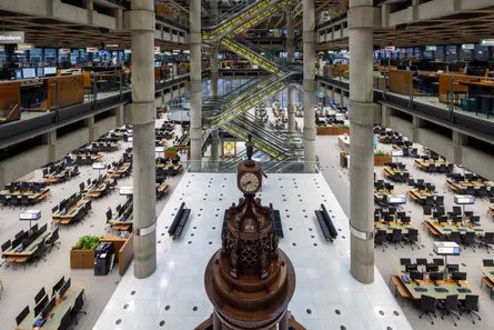 Lloyd’s main trading floor, with its mahogany ‘temple’ holding the Lutine Bell, rung at moments of disaster.