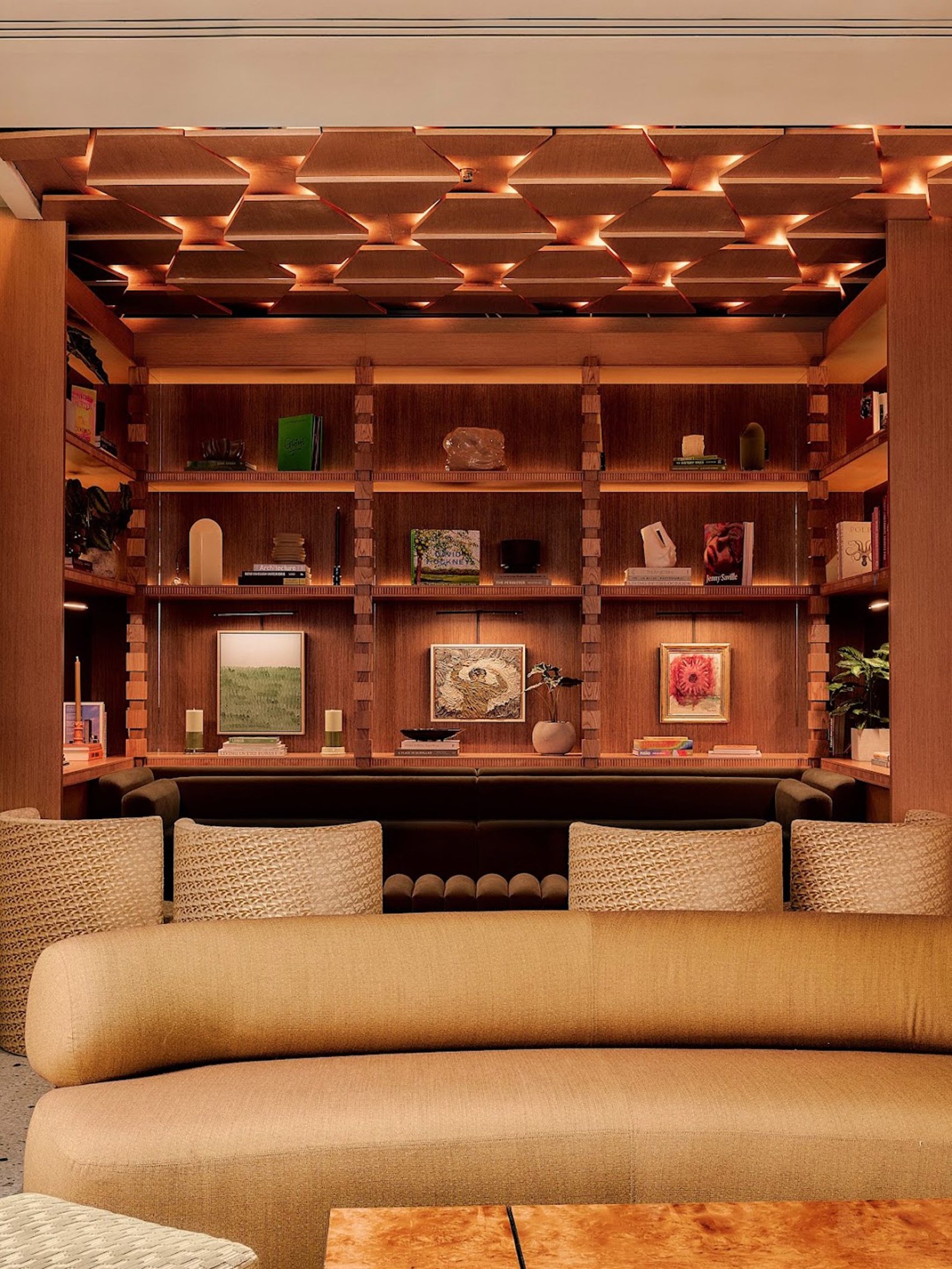 Timber bookcase and seating at Aethos Shoreditch