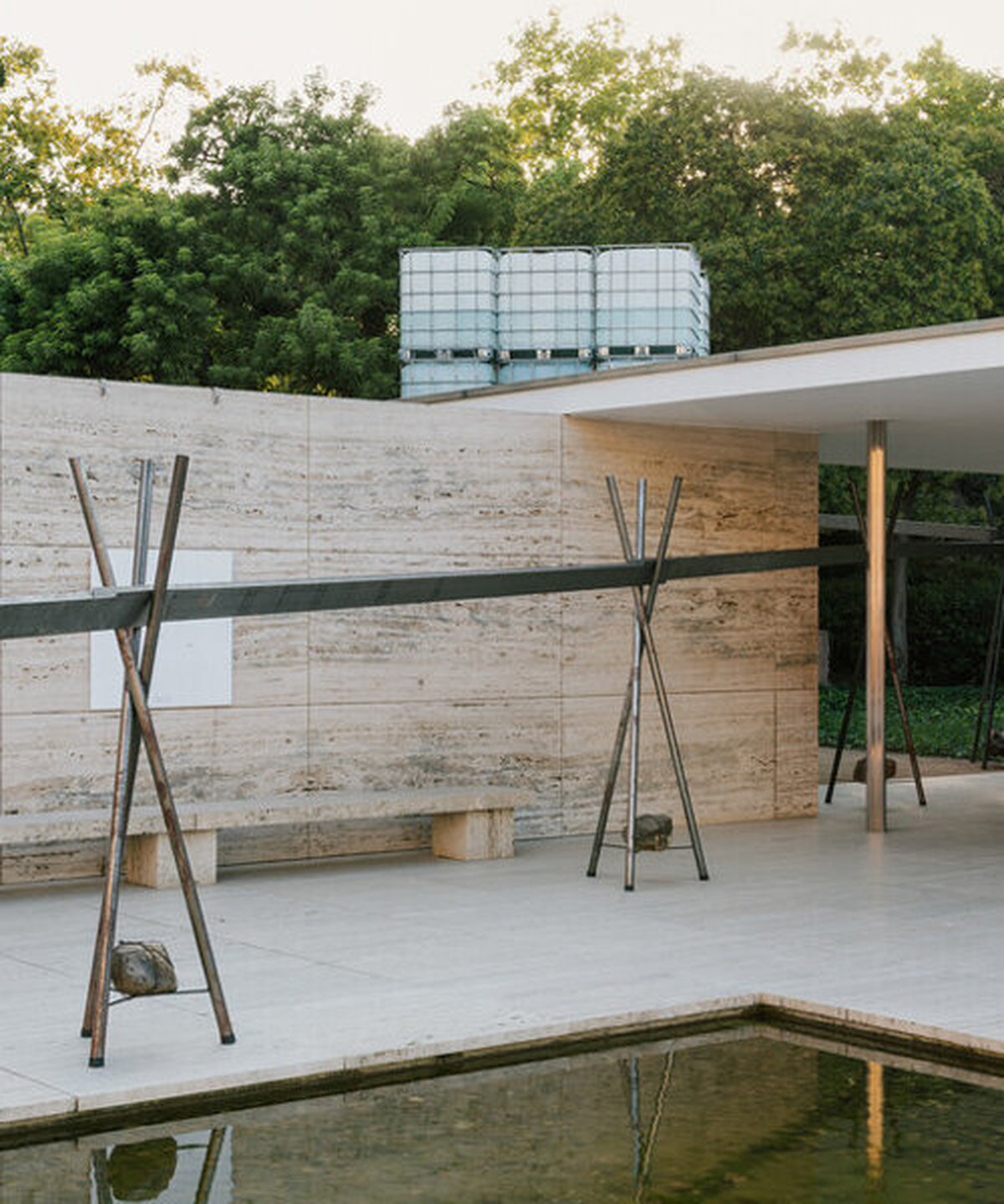 twelve tanks and dripping aqueduct trace water loss at mies van der rohe barcelona pavilion