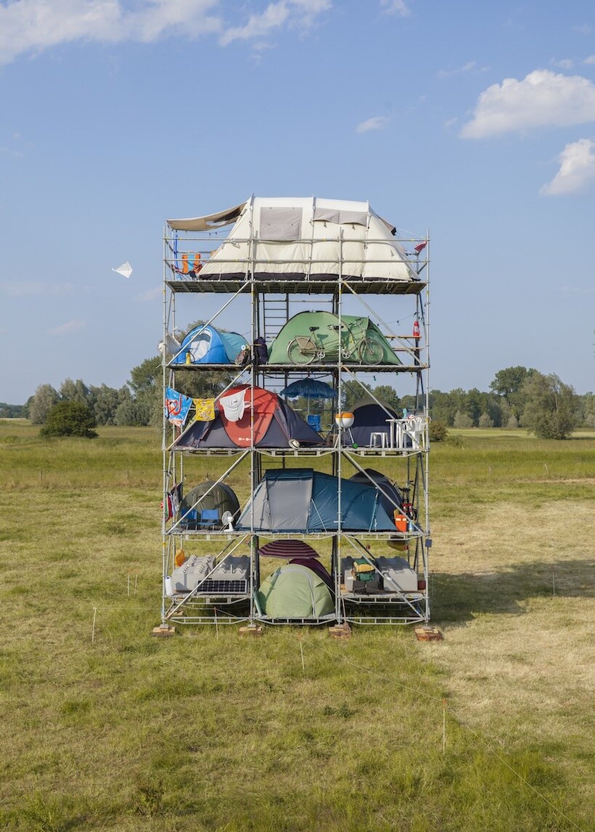 willem de haan stacks 12 tents vertically to question density and the way we occupy space - 1