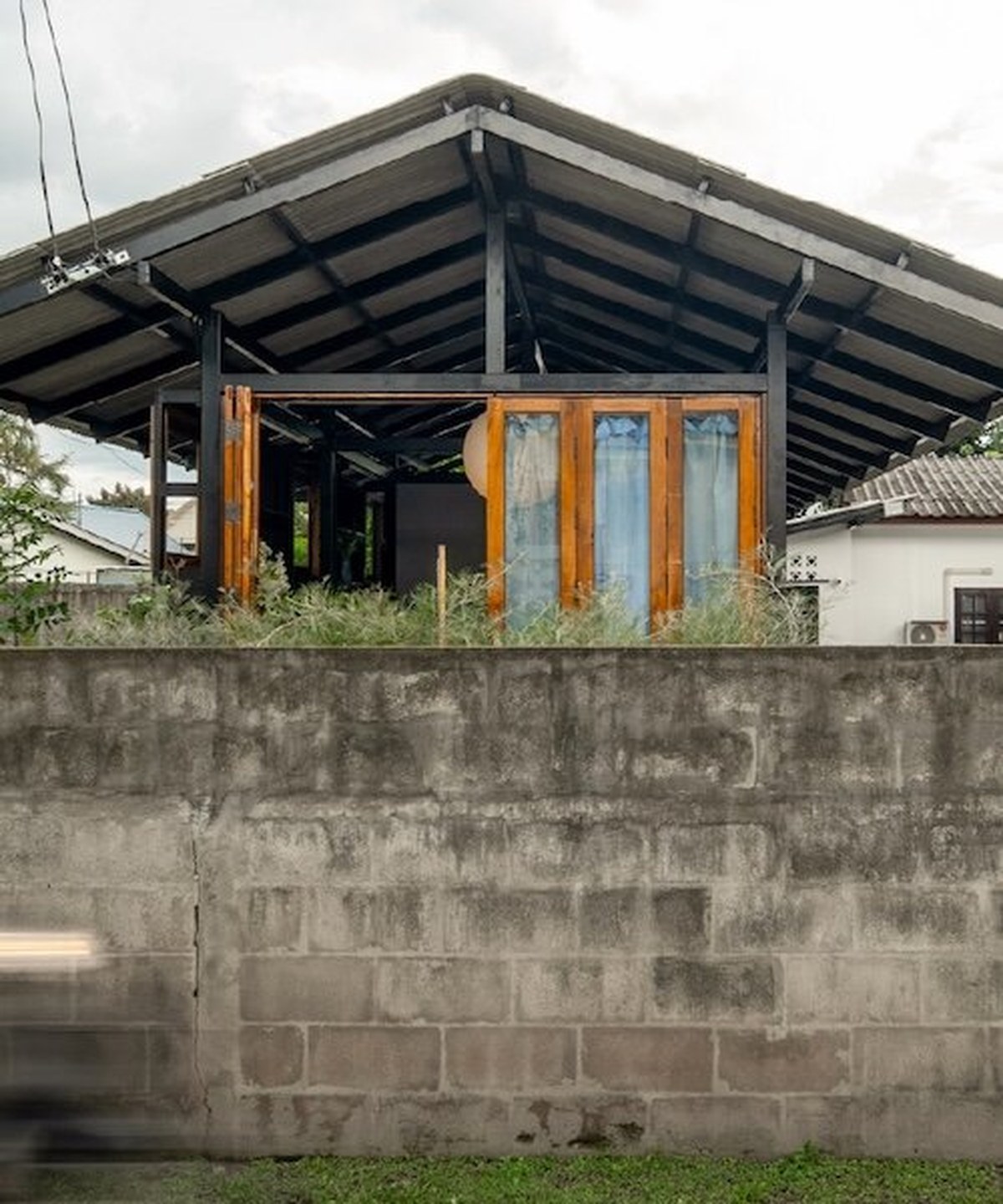 27-square-meter steel and timber pavilion in chiang mai is built for flood resilience