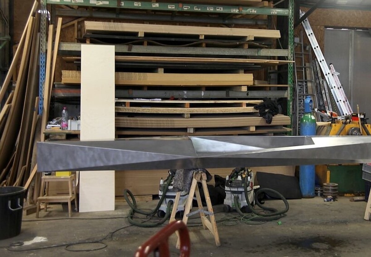 sharp kayak folds aluminum sheet into unsinkable hull with cork seat - 1