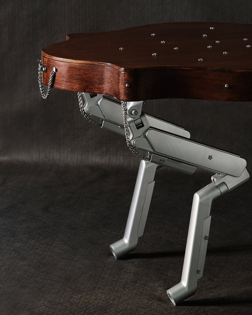 19th-century coffee table gets articulated computer arms to take on a canine form - 5