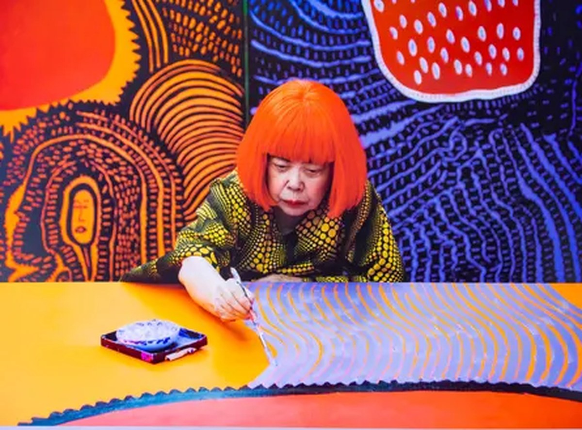 Yayoi Kusama creating a work from her My Eternal Soul series displayed in Cologne, Germany, 2026.