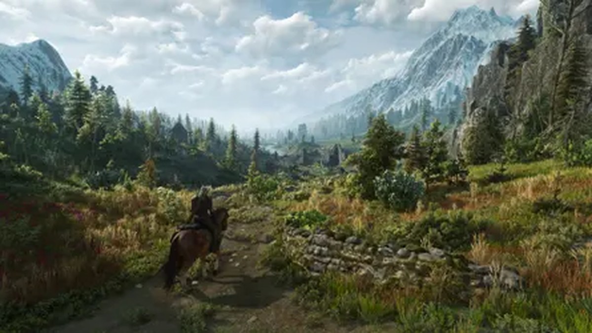 A screenshot from The Witcher 3: Songs of the Past showing valleys and mountains.