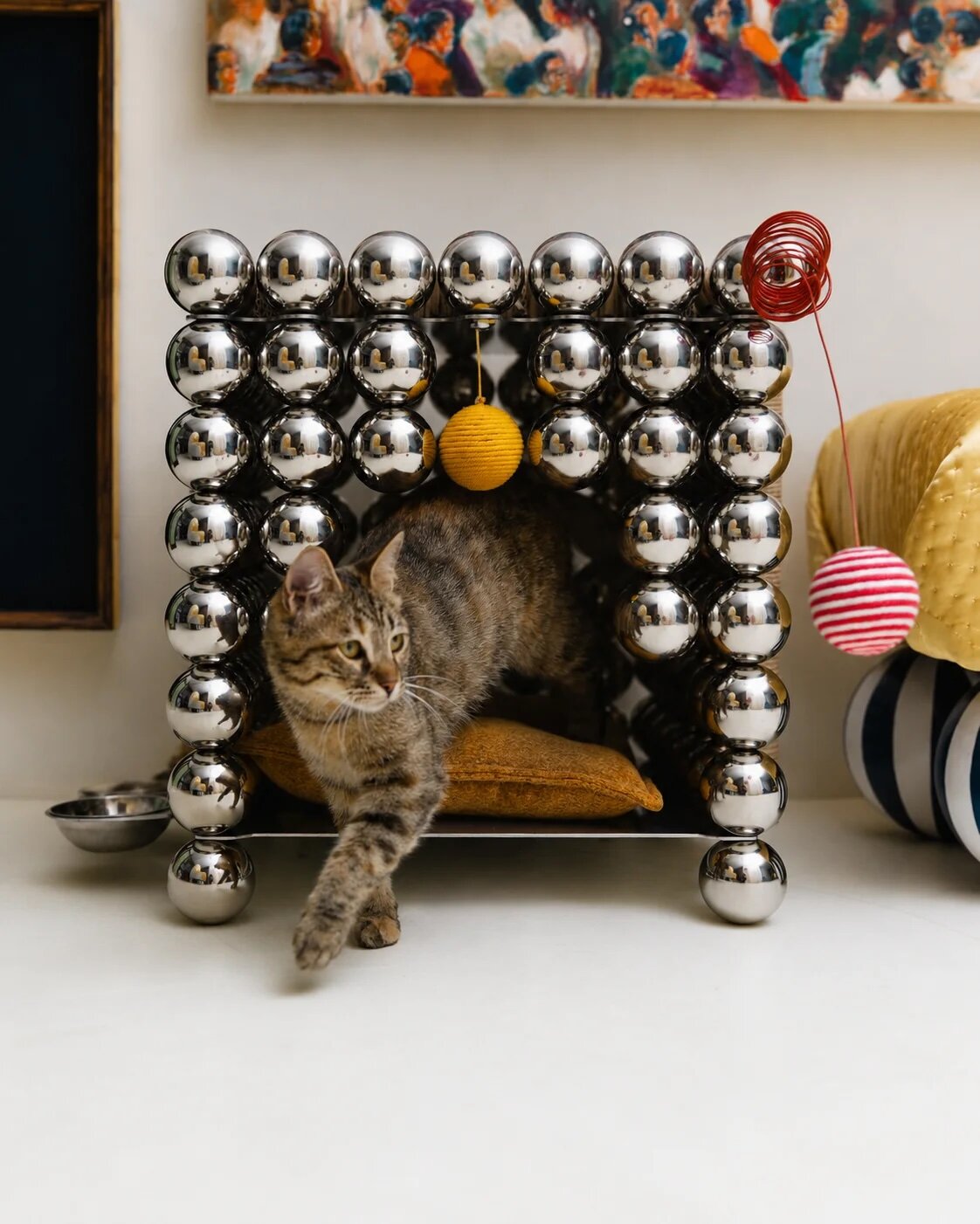 reza raeisifar and saber abar stack steel spheres into chairs, lamps and pet homes - 2