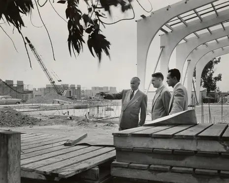 three people in a black-and-white photo