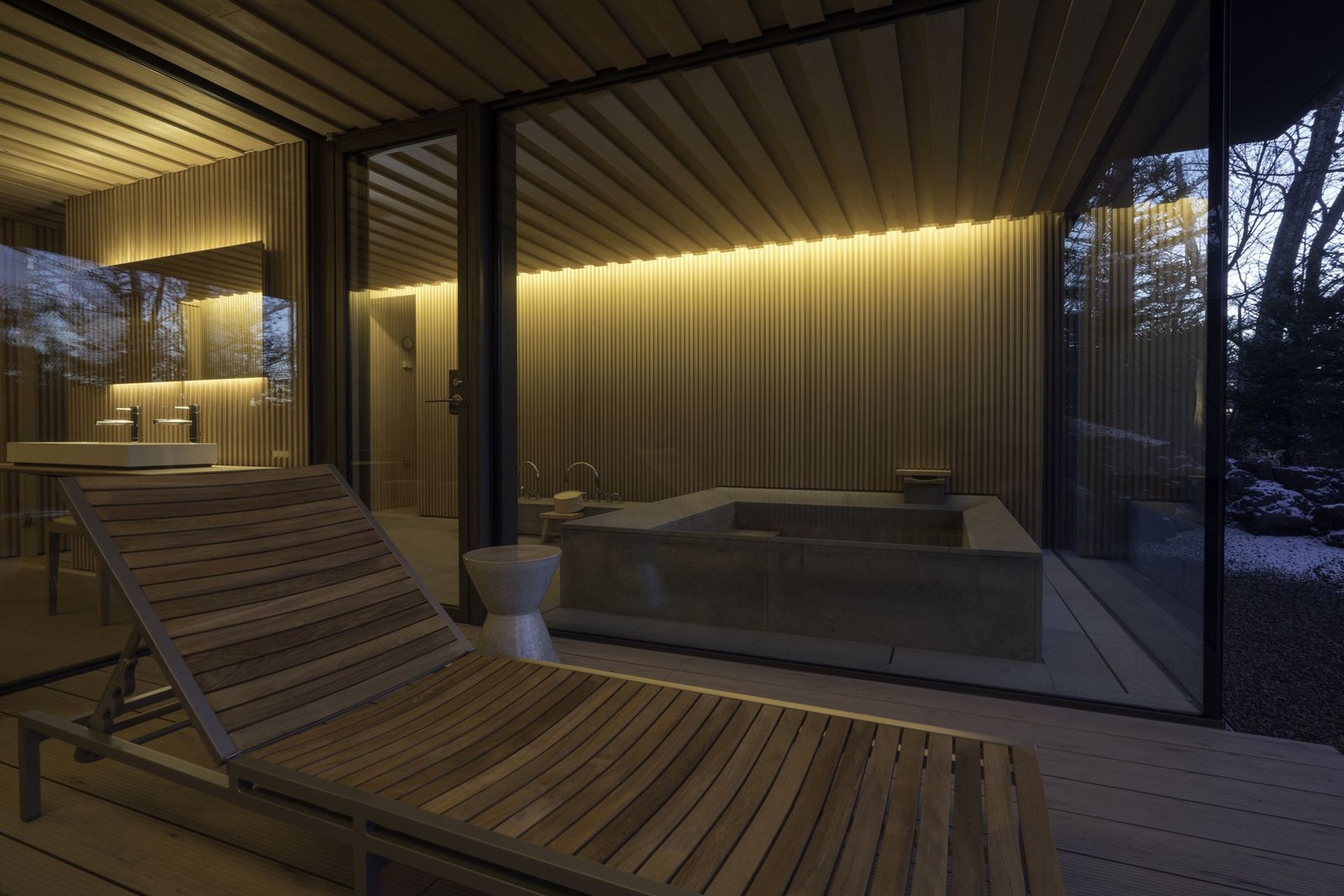 The lower level includes a Japanese bath and sauna