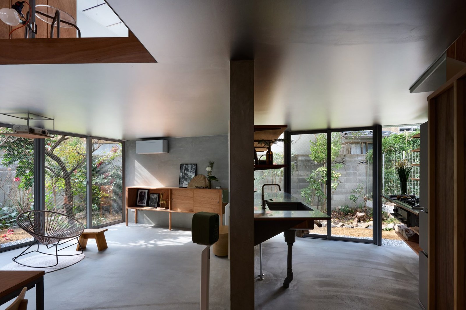 Ground floor interior at House in Shichiku by Tato Architects