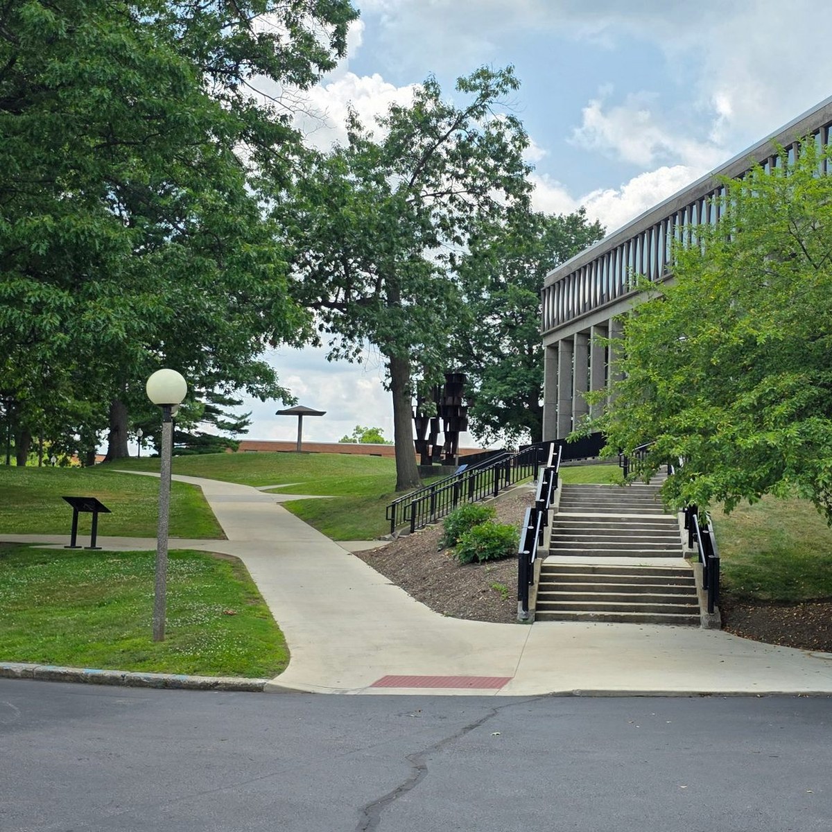 View uphill from the Prentice Hall parking lot to “The Pagoda,” from where guardsmen fired on students.