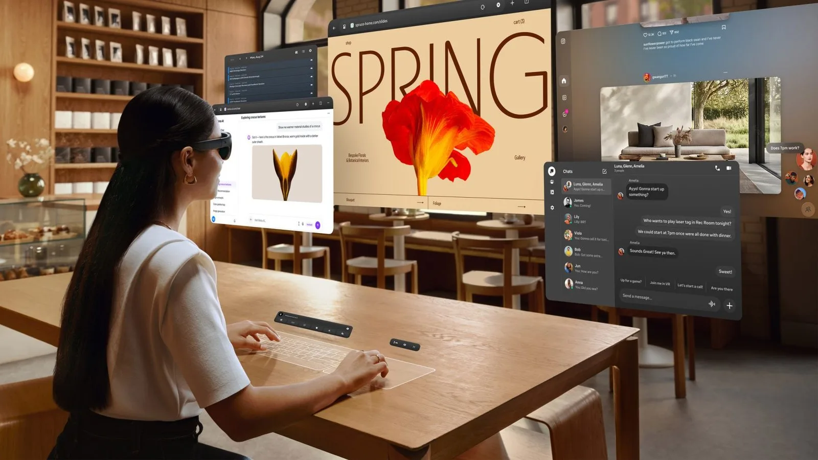 Image of a person from behind wearing the Meta VR Glasses as they work at a desk, with a virtual multi-screen set-up around her as if viewed through her eyes