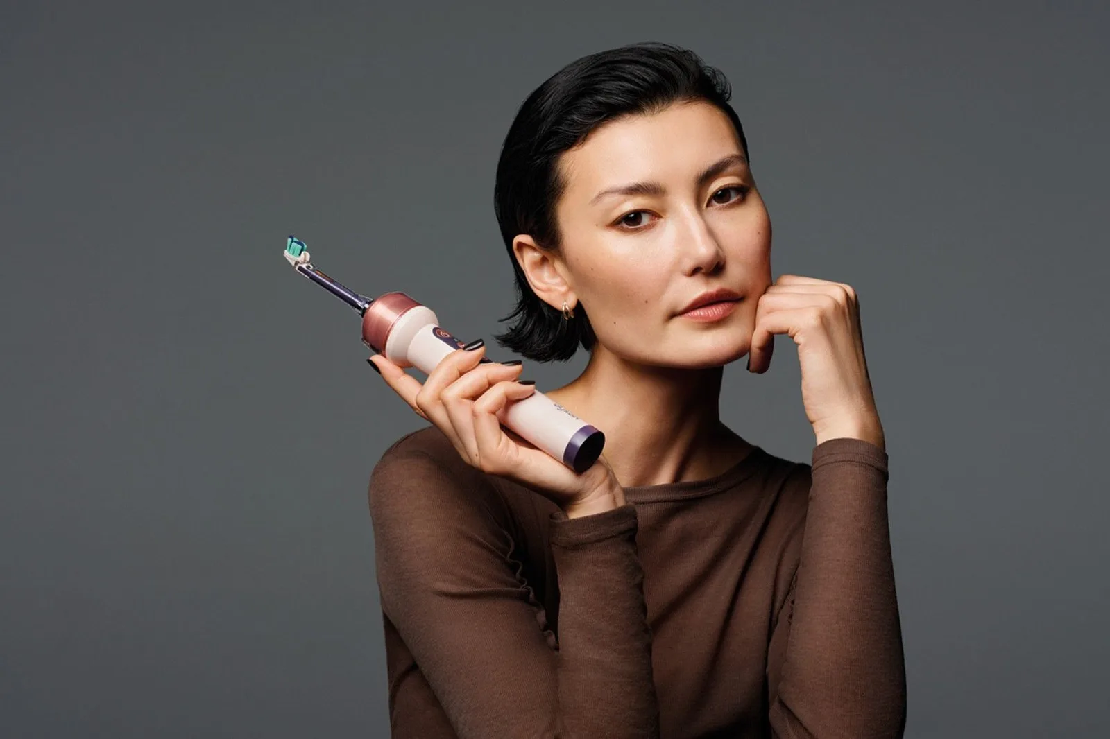 The new Dyson CameraJet Toothbrush in use