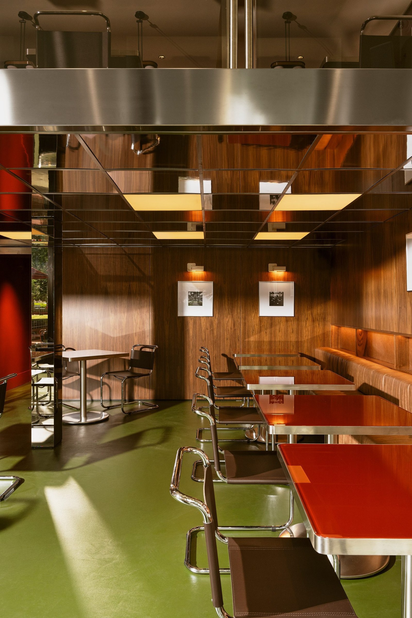 Seating area in bar beneath mezzanine level