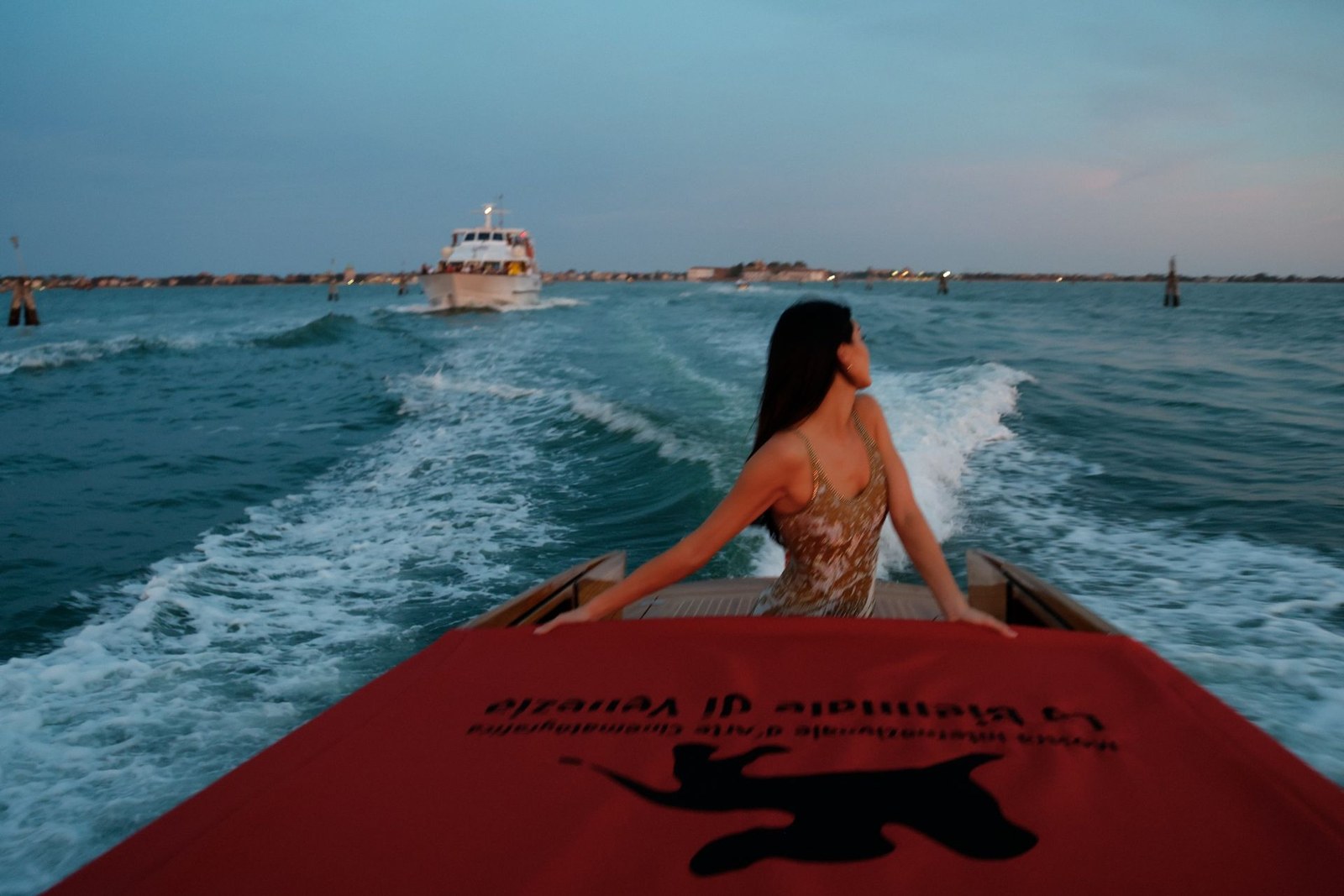 Kendall Jenner at Venice Film Festival wearing Armani and Armani Beauty