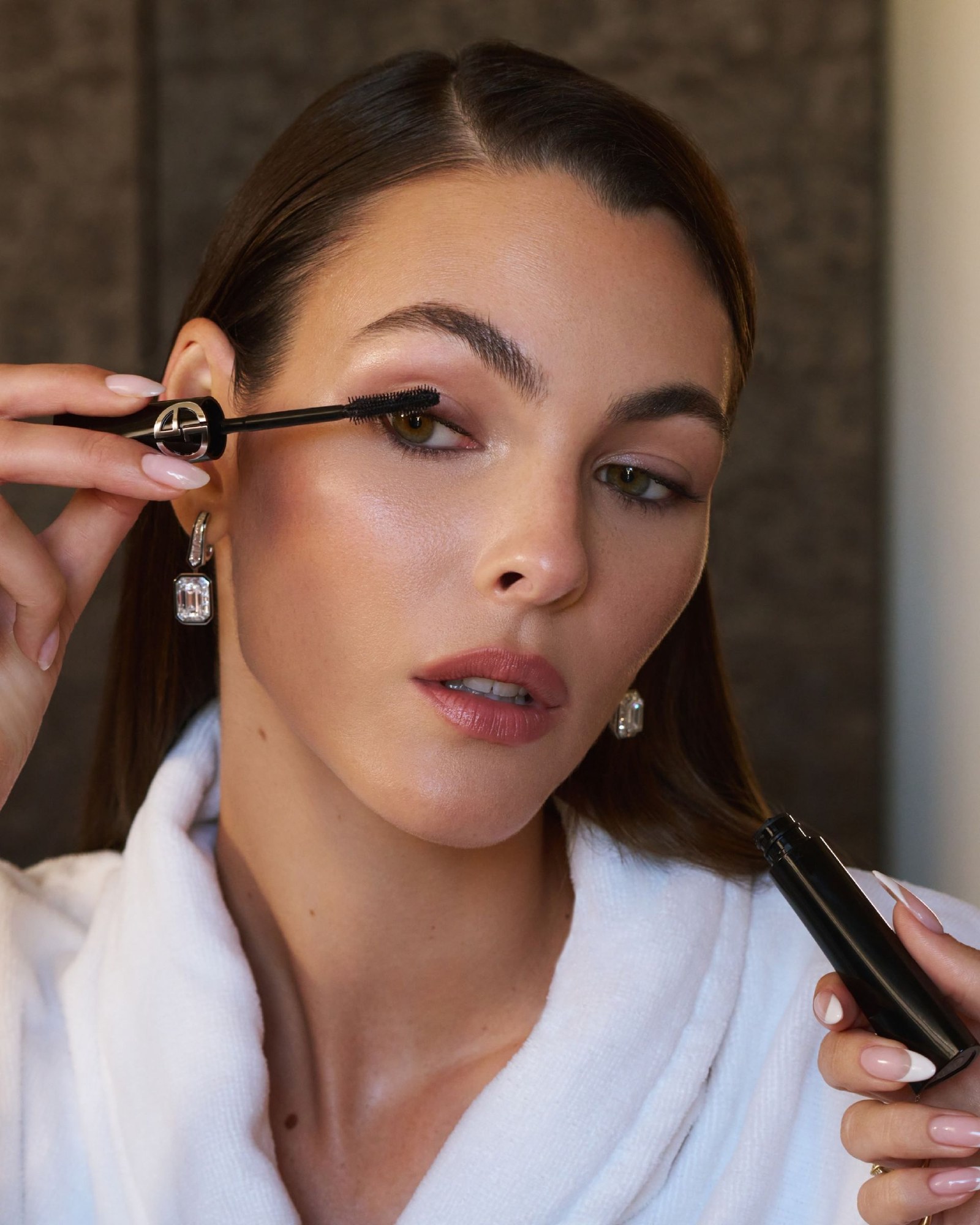 Vittoria Ceretti applying Armani Beauty make-u