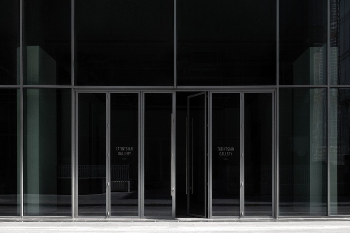 dubai gallery pairs open white exhibition halls with a concealed, brick-toned museum room - 1