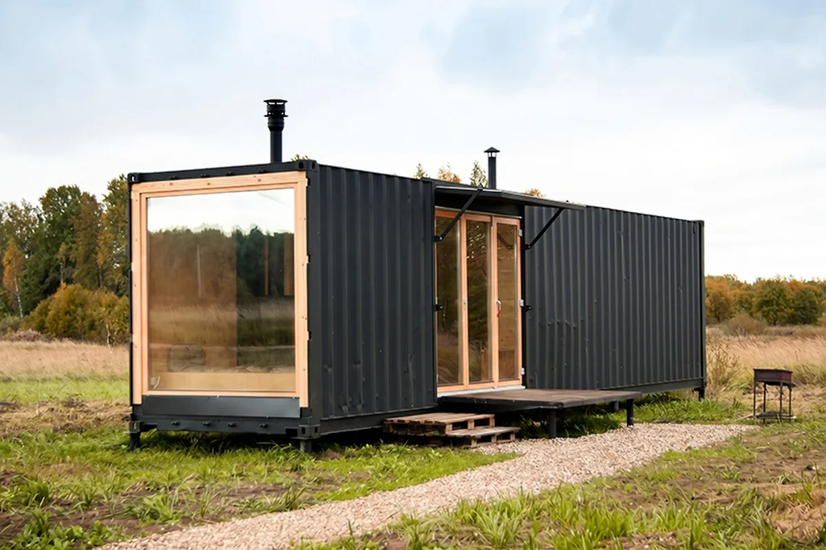 repurposed shipping container becomes 24-sqm birch plywood micro-cabin - 2